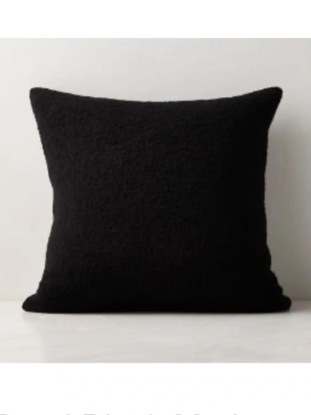 Two CB2 20x20in black boucle pillow covers